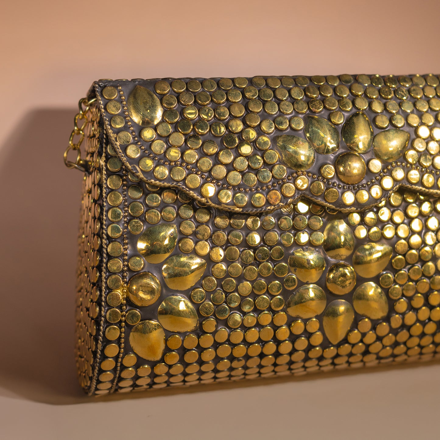Bolso clutch dorada