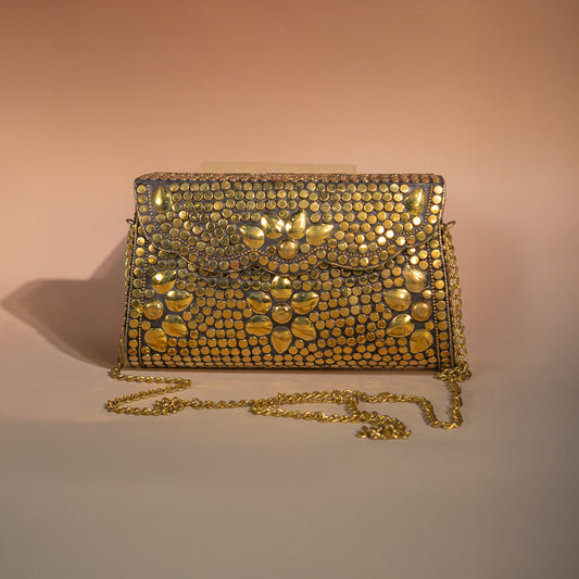 Bolso clutch dorada